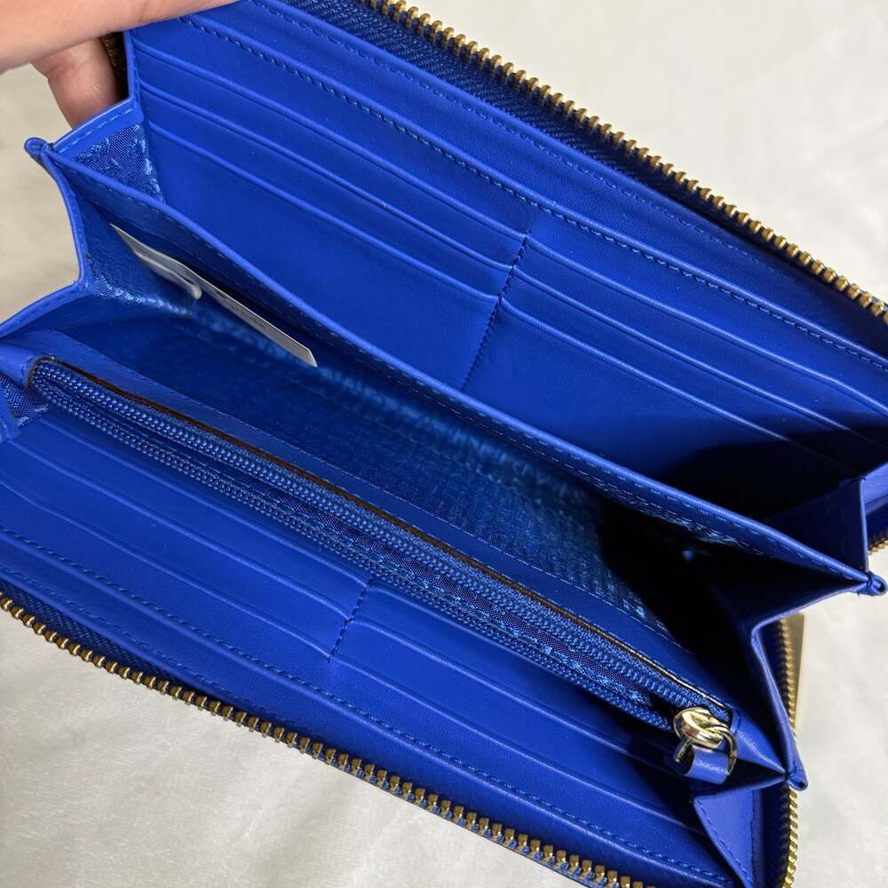 Kate Spade New York Neda Pebble Leather Zip Around Accordion Wallet in Blue